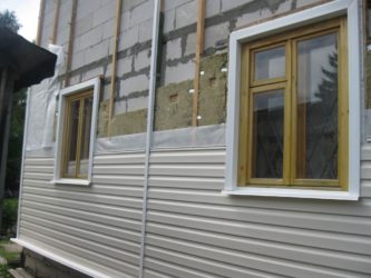 Чем утеплить пеноблок снаружи под сайдинг?