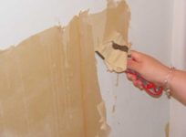 Как убрать старую шпаклевку со стен?